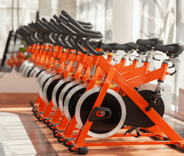 Bikes at a fitness studio showing liability claims for fitness studio