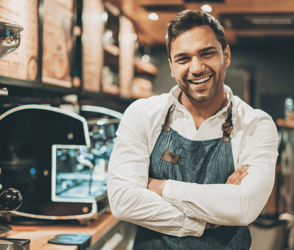 A Coffee Shop Owner at his business