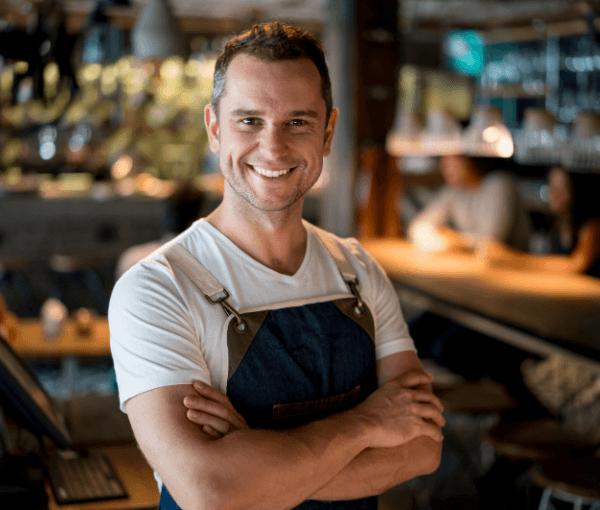 A happy restaurant worker and best Restaurant Insurance