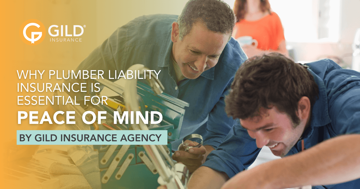 Two plumbers working and smiling because they have plumber liability insurance